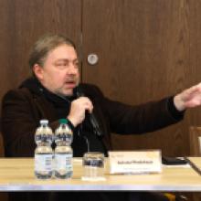 Łukasz Medeksza (Urząd Miejski we Wrocławiu) podczas wypowiedzi na spotkaniu